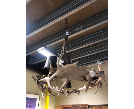 AN ANTLER FIVE LIGHT CHANDELIER.   Dia. 90 x H 79cms.