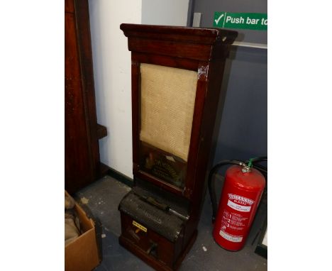 A NATIONAL TIME RECORDER OAK CASED CLOCKING IN CLOCK