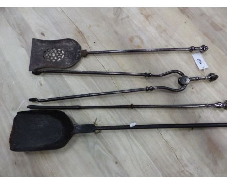  A COLLECTION OF FOUR IRON AND STEEL FIRE TOOLS, COMPRISING TWO SHOVELS, A POKER AND A PAIR OF TONGSFROM THE ESTATE OF PHILIP
