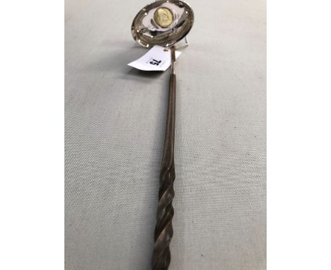 A SCOTTISH SILVER TODDY LADLE WITH TWISTED HORN HANDLE, THE BOWL CENTRED WITH GILDED 1787 SHILLING.