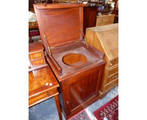 A 19th C.WASHING CABINET, THE LIFT UP TOP OVER A BOWL RECEIVER, THE SEPARATE MIRROR ONCE FITTING INSIDE THE LID, THE CUPBOARD