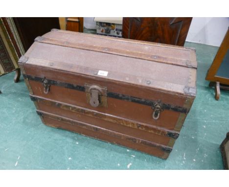 Wooden bound dome top trunk