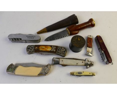 Vintage penknives - Swiss Army, Marksman Tools, mother of pearl handled etc.  Ornamental dagger and vintage Eleys tin. This b