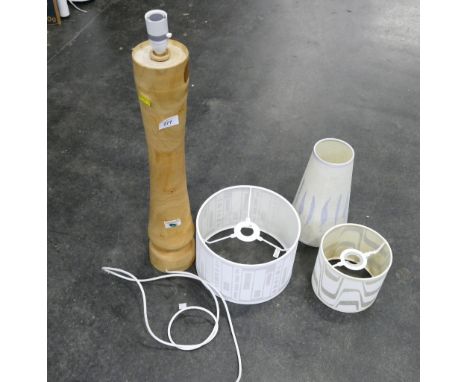 Vintage turned wooden lamp base and three retro vellum lamp shades