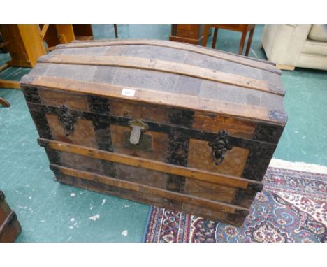 Wooden bounded dome top trunk