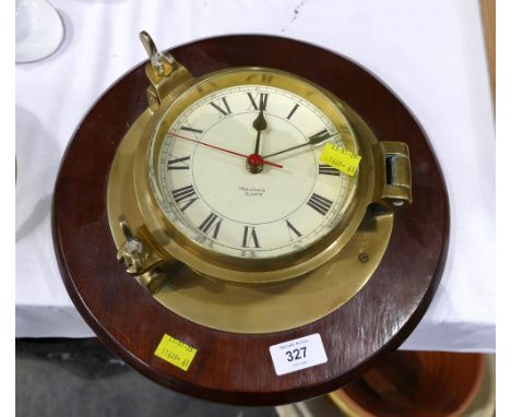 Nauticalia quartz bulkhead style clock mounted on a wooden plaque
