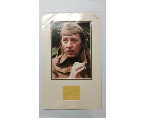 ENTERTAINMENT, signed piece by James Beck (staple holes), overmounted beneath h/s colour photo showing him in character from 