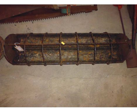 A small cast iron pig trough