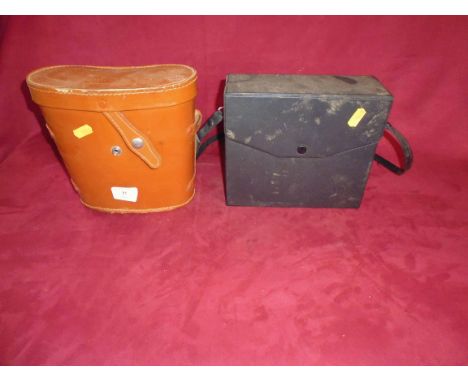 A pair of Vintage binoculars, one by Boots in leather case