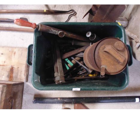 A box containing various hand tools, garden sprayers etc.