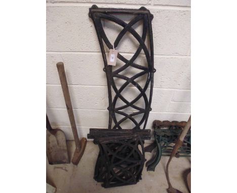 Three pairs of cast iron table ends and three bench back panels