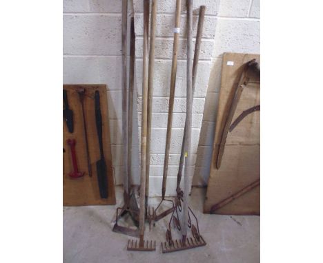 A quantity of old garden tools
