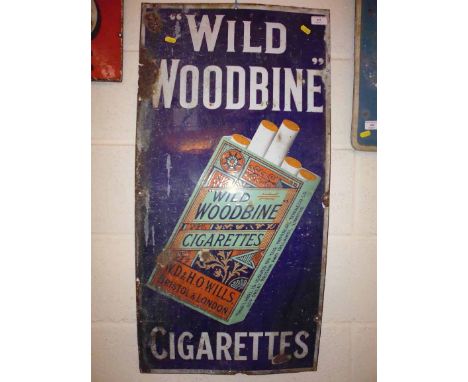 A "Wild Woodbine Cigarette" enamel sign measuring approx. 18ins x 36ins