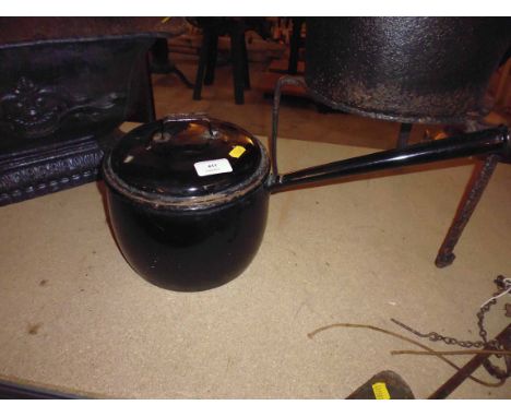 A small enamel saucepan and lid
