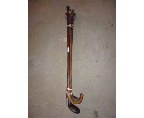 Two early golf clubs, shooting stick and walking stick