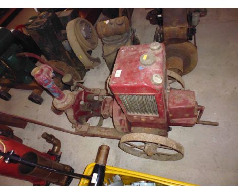 A Bernard of Paris stationary engine on trolley coupled to water pump, type W0. 2.5hp. serial no. 290406