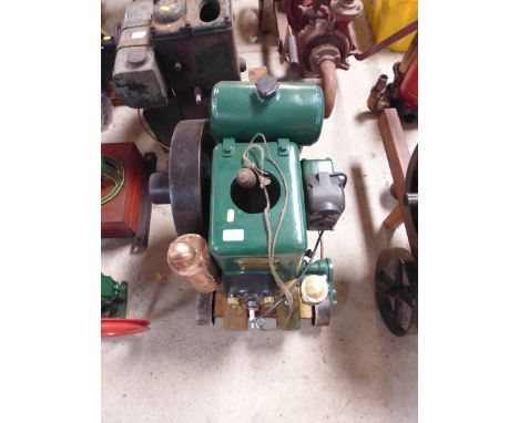 A Ruston &amp; Hornsby stationary engine on trolley, class PB. 1.5hp. serial no. 215242, bearing plaque "Sold by E.H. Knight 