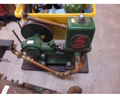 An Argosy water pump for stationary engine, serial no. 29068, bearing the name "F.W. Brackett &amp; Co. Ltd., Colchester, Eng