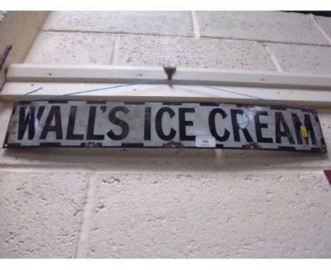 An enamel sign, "Wall's Ice Cream", measuring approx. 55ins x 4ins