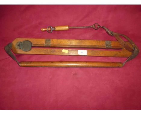 A Vintage wooden game carrier with priest