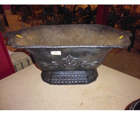 A Victorian cast iron planter