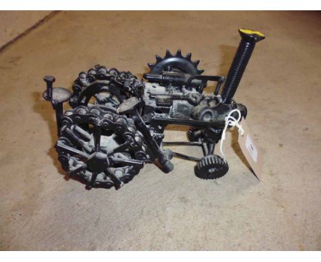 A model of a steam engine made from scrap