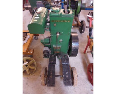 A Lister stationary engine on trolley, no. 107540, spec. 13D2T - vendor reports that this engine has had some restoration wor