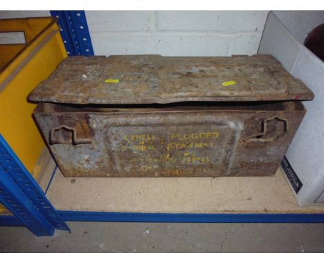 A metal ammunition box with various tools