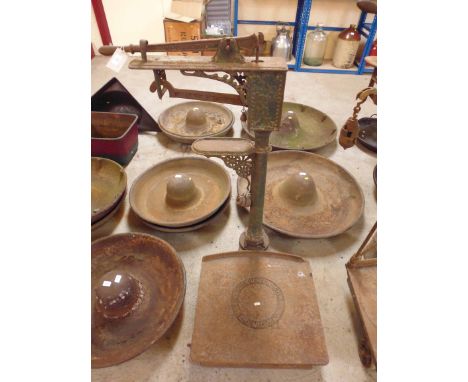 A set of Winsbury &amp; Son of London sack scales with weights