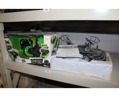 A Tech RC quadcopter with camera together with a Ghost remote controlled toy, sold as seen