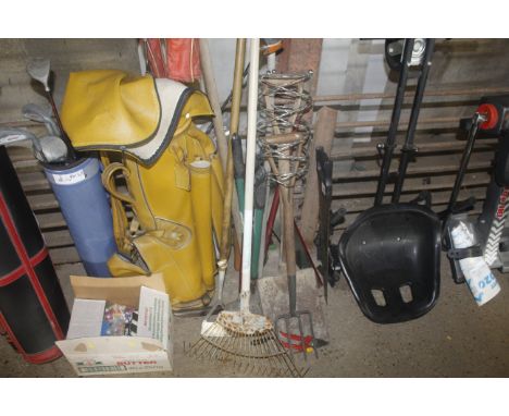 A collection of long handled garden tools