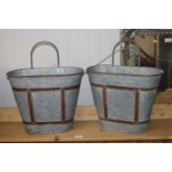 Two galvanised wall planters