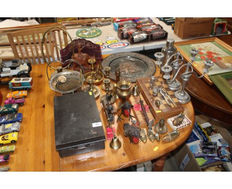 A collection of various metal ware to include a copper tray, silver plated candelabra, a cash tin, brass candlesticks etc. to