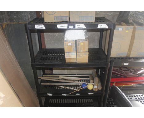 A black plastic four tier shelf