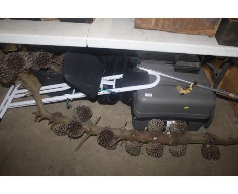 A suitcase; a waste bin; exercise bench etc.