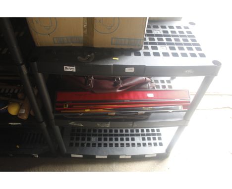 A black plastic three tier shelf