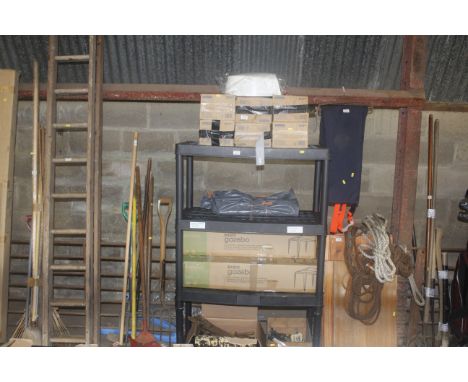 A black plastic four tier shelf