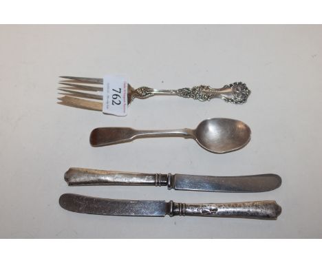 A sterling silver fork approx. 31gms together with a sterling silver spoon monogrammed initials A.F. approx. 16.5gms and two 