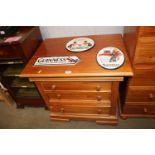 A modern pine chest fitted three drawers