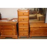 A pine chest fitted five drawers of narrow proportions