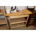 A pine kitchen trolley fitted two drawers
