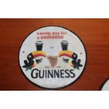 A reproduction Guinness advertising sign (122)