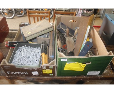 Two boxes containing various hand tools, rivet guns, nails etc 