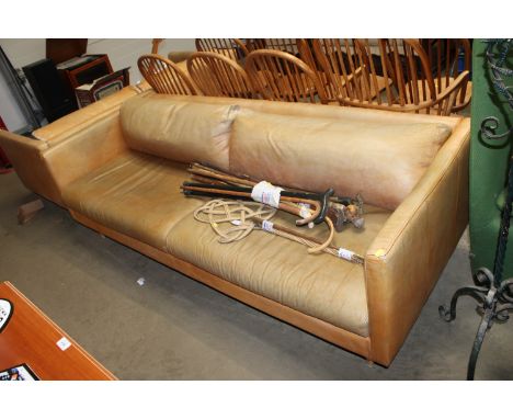 A leather upholstered two seater sofa