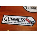 A reproduction Guinness advertising sign (124)
