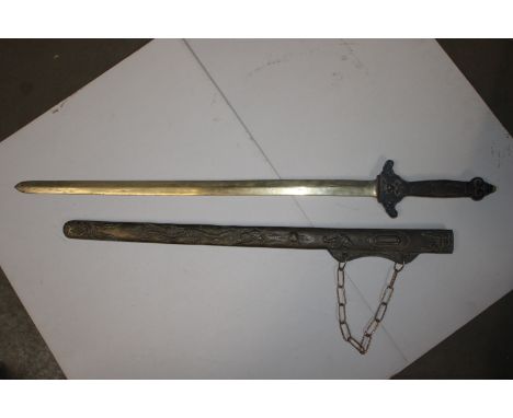 An Oriental decorated sword and scabbard
