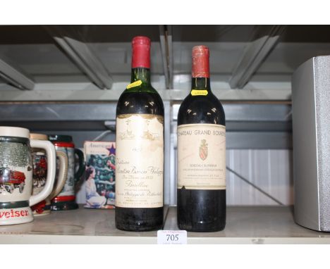 A bottle of Chateau Mouton Baron Philippe Rothschild 1973 together with a bottle of Chateau Grand Bourdieu Bordeaux Superieur