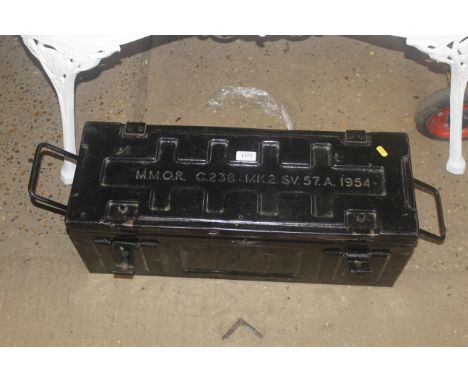 A metal ammunition crate dated 1954