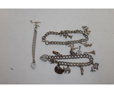 A sterling silver bracelet hung with various white metal charms approx. 26gms together with another silver bracelet having pa