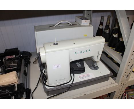 A Singer sewing machine sold aa a collectors item